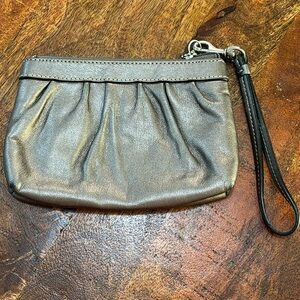 COACH Corner Zip Silver Metallic Signature Embossed Pleated Leather Wristlet Bag
